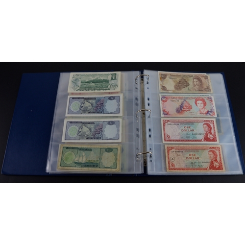 454 - British Commonwealth (90), a good group of Queen Elizabeth II portrait notes in an album, Bahamas (1... 