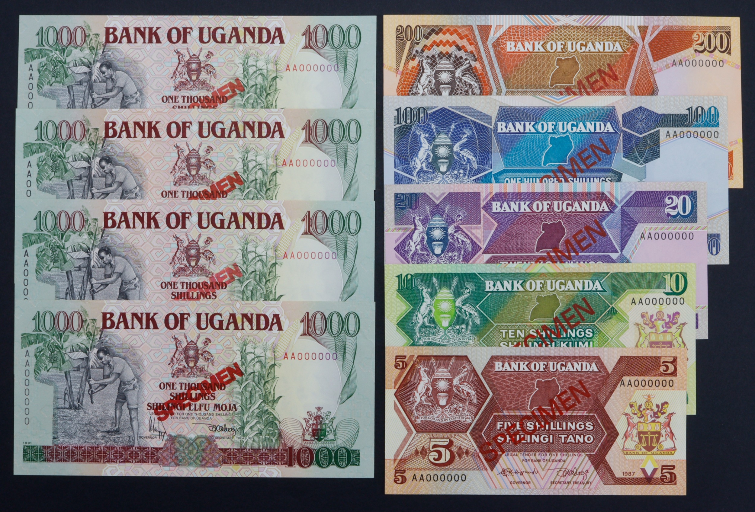 Uganda (9), a group of SPECIMEN notes, 200 Shillings, 100 Shillings, 20 ...