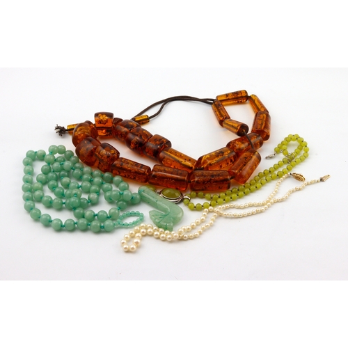 286 - Four beaded necklaces, graduated cultured pearls on 9ct clasp, length 47cm. Imitation jade bead neck... 