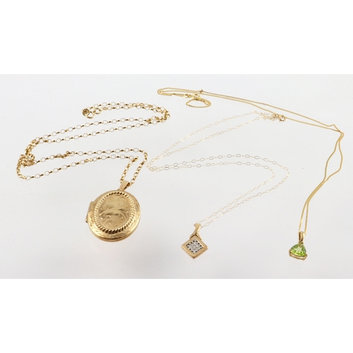 298 - Three 9ct chains with pendants / photo locket. Total weight 9.7g