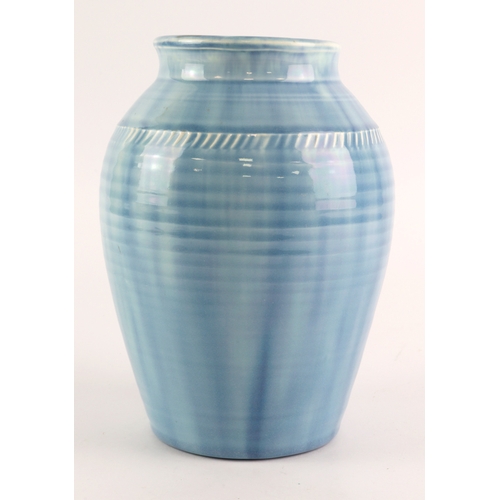 103 - Moorcroft. 'Natural Range' monochrome baluster vase in pale blue glaze, height 18cm approx.