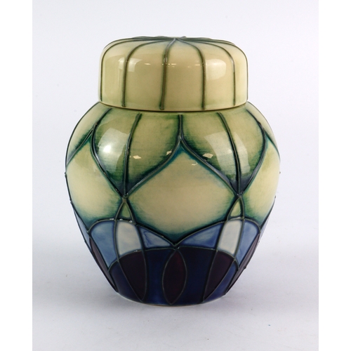 104 - Moorcroft. Pottery ginger jar in the 'Indigo' pattern, design by Emma Bossons, stamped to the base, ... 