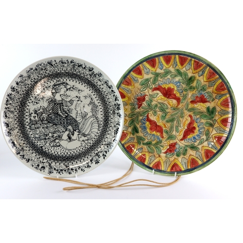 115 - Platters. Two large display  pottery platters ,one is unmarked but very decorative & has age, the ot... 