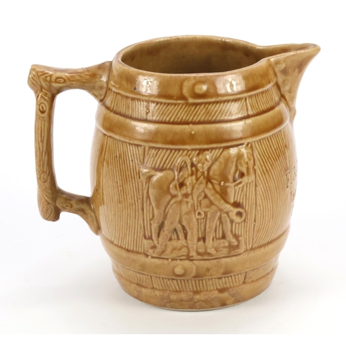 70 - Harvest? Type pottery jug, impressed on the front 