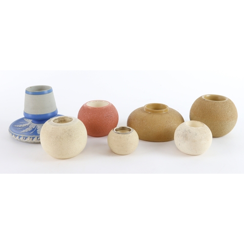 80 - Match-holder/strikers (7), including one attractive Wedgewood Pottery blue and white type, and six o... 