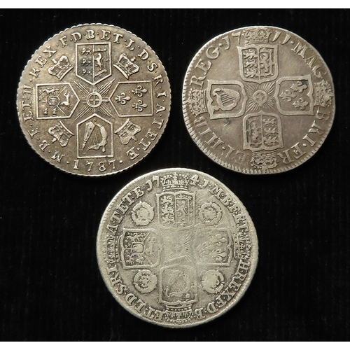 214 - Shillings (3): 1711 S.3618, GF; 1741 roses in angles, S.3701, fair, and 1787 with hearts, VF-GVF.