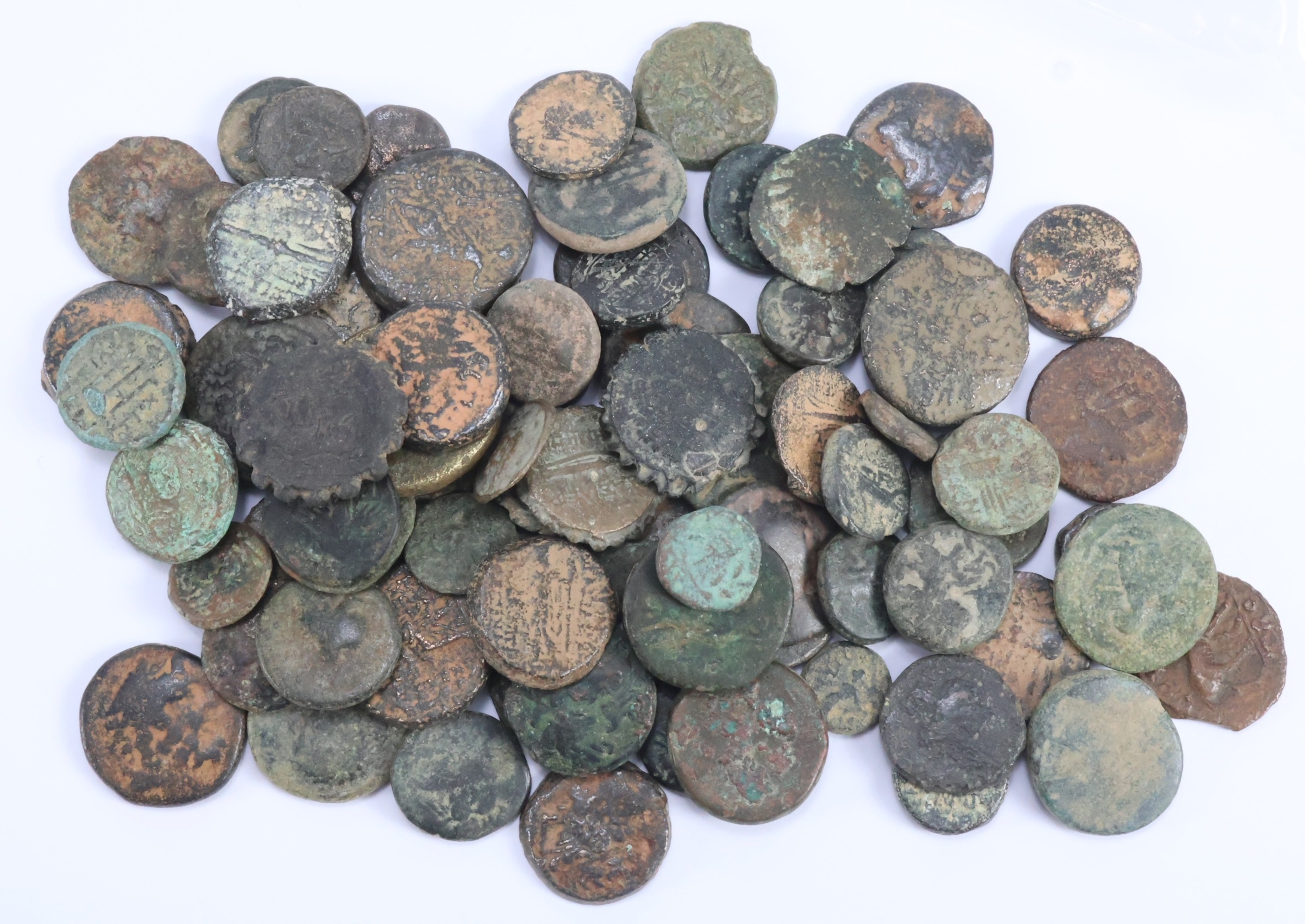 Ancient bronze coins (84) mostly Greek, mixed grade, many 'desert patina'.
