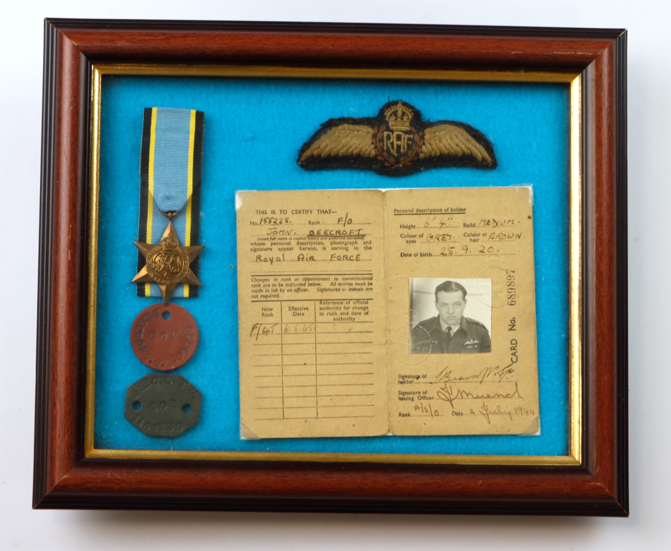 RAF WW2 framed pilots ID card, ID tags, kings crown pilots wings and a ...