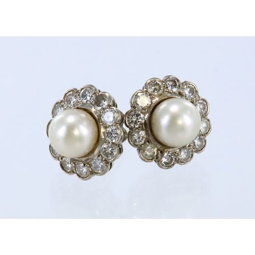 301 - Yellow and white metal (tests 18ct) pearl and diamond stud earring with post fittings (no butterflie... 