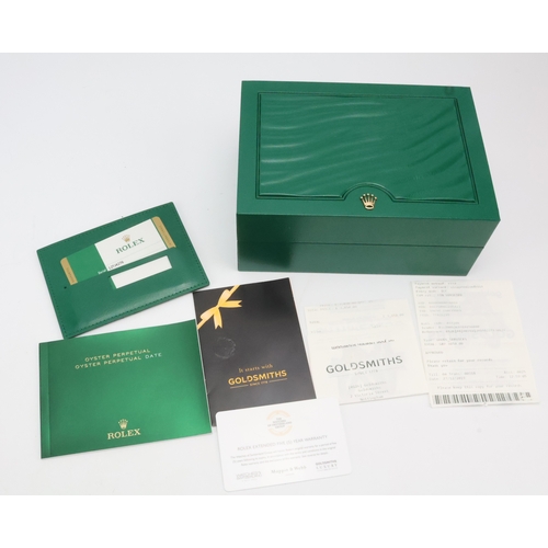 551 - Rolex Oyster Perpetual 34, stainless steel, ref. 114200, 2019 card. The green dial with luminous bat... 