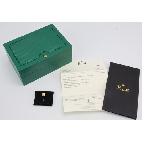 552 - Rolex Oyster Perpetual 41, stainless steel, ref. 124300, 2021 card. The silver dial with luminous ba... 