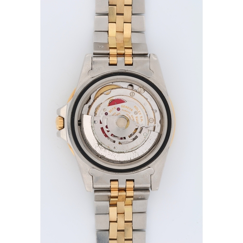 558 - Rolex Oyster Perpetual Date GMT-Master, steel and gold, ref. 16753, 8,2xx,xxx serial (1984). The bla... 
