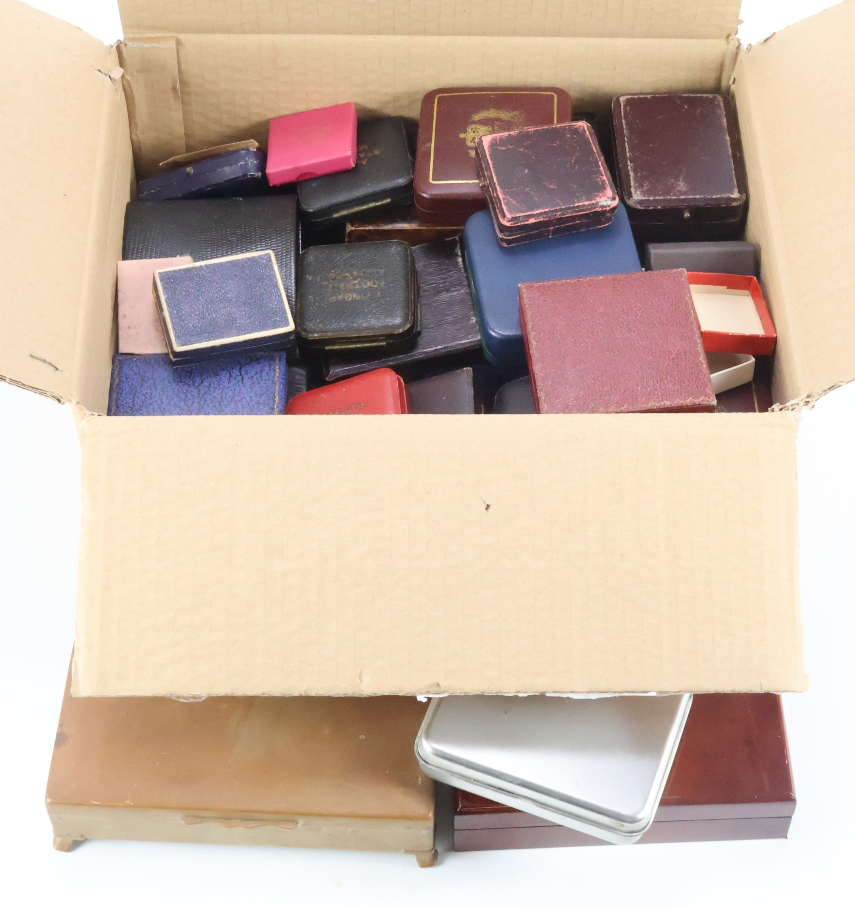 Militaria: A card box containing assorted fob boxes/cases dating ...