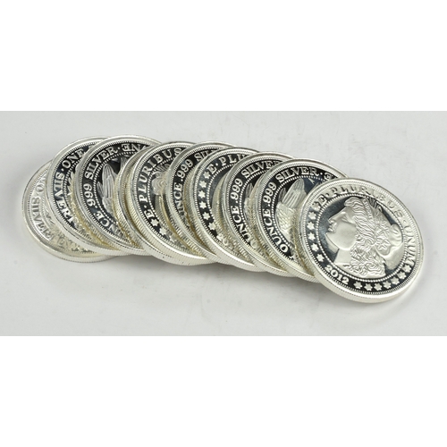 42 - Silvertowne 1oz rounds (10) All dated 2012. BU