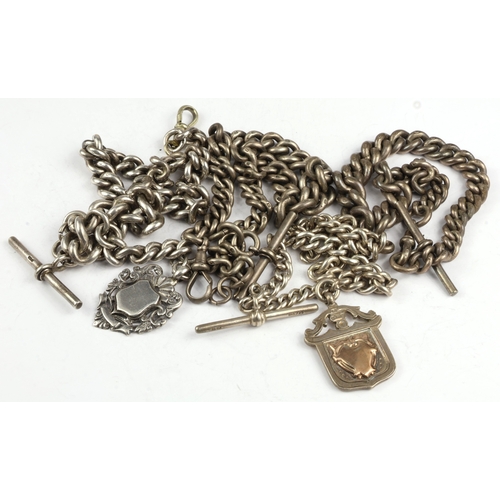 6 - Silver Albert chains (4), each of curb links, attached a variety of dog-clips, T-bars and fobs, gros... 