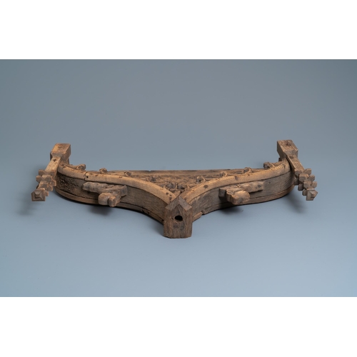 1 - An arch-shaped carved oak baldachin or throne top, France, 15th C.L.: 72 cm - H.: 47 cm  Provenance:... 