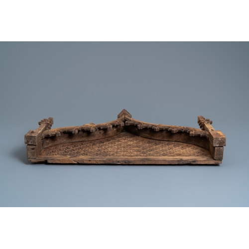 1 - An arch-shaped carved oak baldachin or throne top, France, 15th C.L.: 72 cm - H.: 47 cm  Provenance:... 