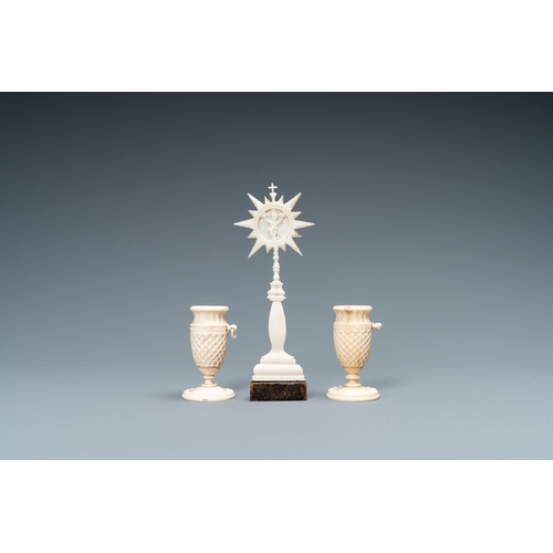 101 - A small ivory crucifix monstrance and a pair of small bone candlesticks, Dieppe, France, 19th C.Lot ... 