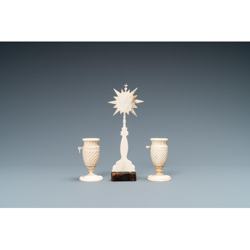 101 - A small ivory crucifix monstrance and a pair of small bone candlesticks, Dieppe, France, 19th C.Lot ... 