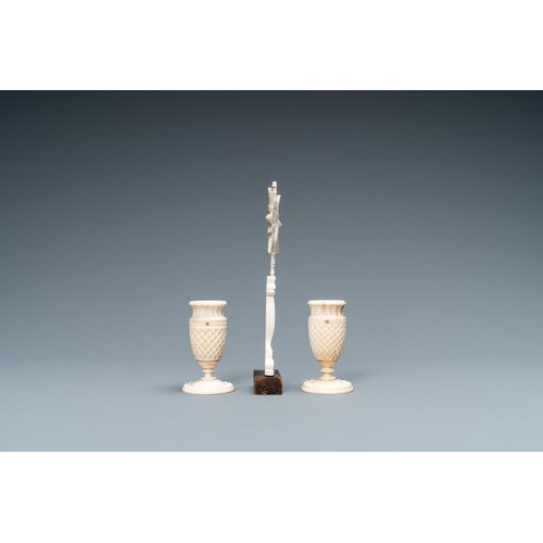 101 - A small ivory crucifix monstrance and a pair of small bone candlesticks, Dieppe, France, 19th C.Lot ... 