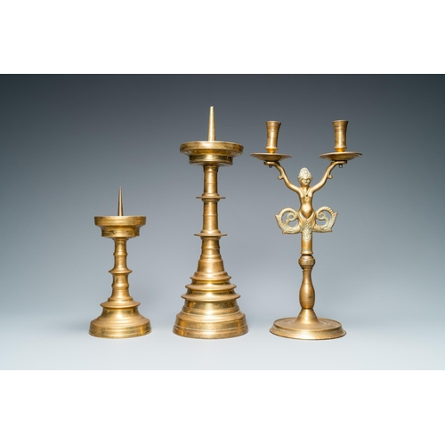 11 - Three bronze candlesticks, Flanders and Germany, 16th C.H.: 44,5 - 41,5 - 28 cm  Provenance: - The D... 