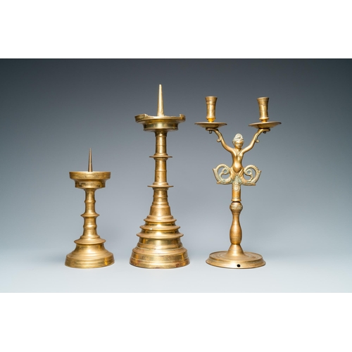 11 - Three bronze candlesticks, Flanders and Germany, 16th C.H.: 44,5 - 41,5 - 28 cm  Provenance: - The D... 