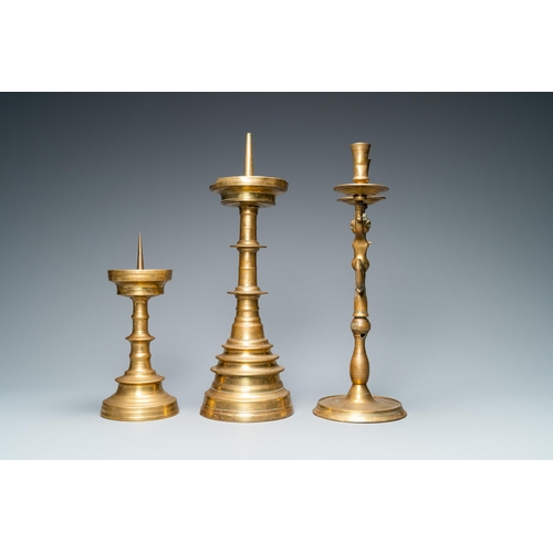 11 - Three bronze candlesticks, Flanders and Germany, 16th C.H.: 44,5 - 41,5 - 28 cm  Provenance: - The D... 