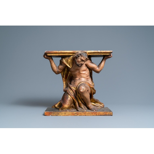 115 - A polychromed and gilded wooden console in the shape of a kneeled Atlas figure, Italy, 17th C.H.: 37... 