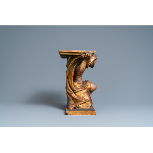 115 - A polychromed and gilded wooden console in the shape of a kneeled Atlas figure, Italy, 17th C.H.: 37... 