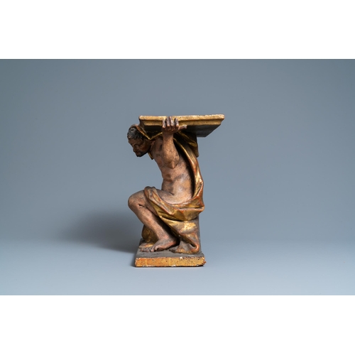 115 - A polychromed and gilded wooden console in the shape of a kneeled Atlas figure, Italy, 17th C.H.: 37... 