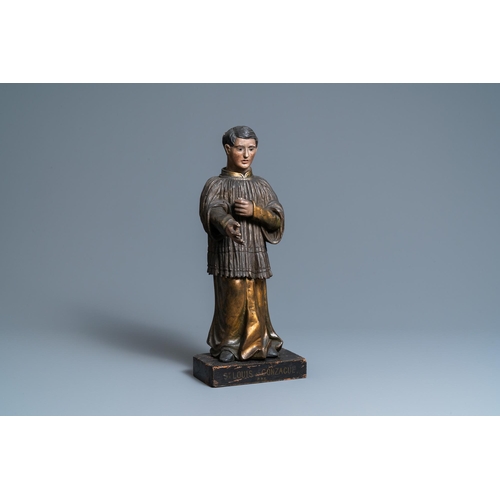 116 - A polychromed and gilded wooden figure of Aloysius Gonzaga with glass eyes, Italy, 18th C.H.: 48 cm ... 