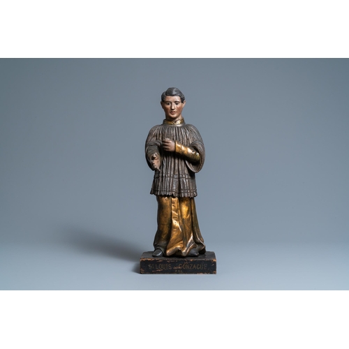 116 - A polychromed and gilded wooden figure of Aloysius Gonzaga with glass eyes, Italy, 18th C.H.: 48 cm ... 