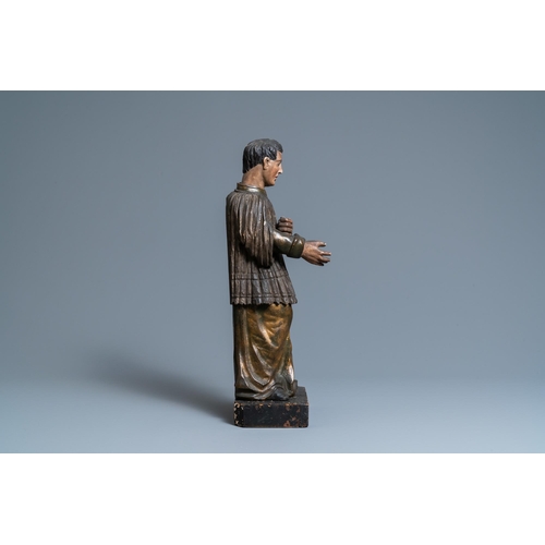 116 - A polychromed and gilded wooden figure of Aloysius Gonzaga with glass eyes, Italy, 18th C.H.: 48 cm ... 