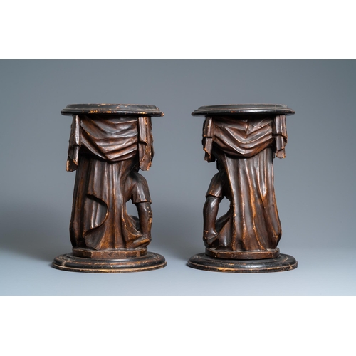 117 - A pair of patinated coniferous wood candle supports in the shape of kneeling Moors, Venice, Italy, 1... 