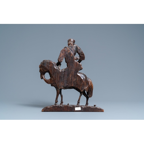 123 - An oak figure of a rider on horseback, 1st half 16th C.H.: 40,5 cm - L.: 34 cm  Provenance: - The Da... 