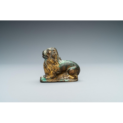 126 - A gilt-bronze model of a recumbent lion, France, 14th C.L.: 7,5 cm - H.: 6 cm  Provenance: - The Dav... 