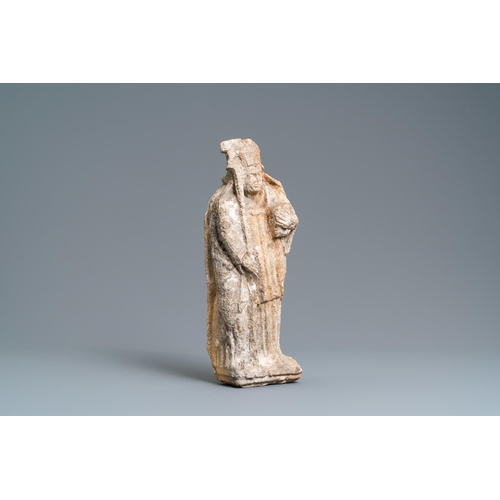 141 - A stone figure of a bishop, late 15th C.H.: 45 cm  Provenance: - The Davioud-Larminet collection, Li... 