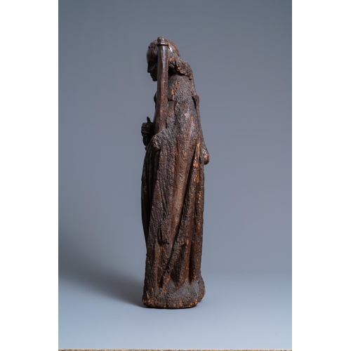 146 - An oak figure of an angel holding the Instruments of the Passion, Brabant region, Southern Netherlan... 