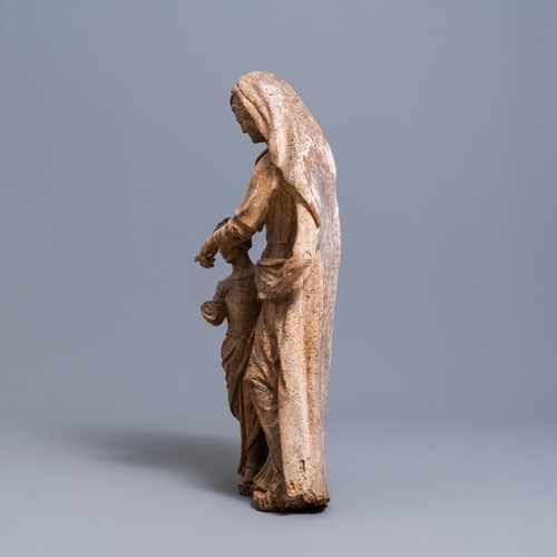 153 - A limewood group depicting Saint Anne teaching the Virgin Mary, late 16th C.H.: 83,5 cm  Provenance:... 