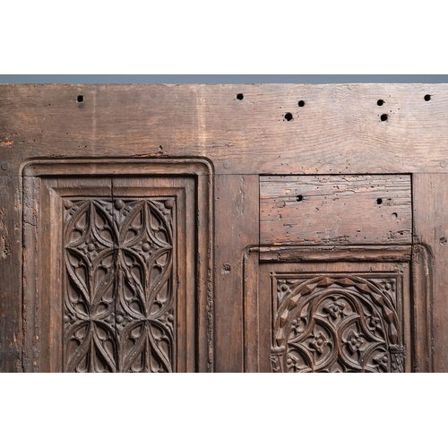 16 - A carved oak front panel of a coffer with tracery panels, 15th C.Dim.: 86,5 x 55 cm  Provenance: - T... 