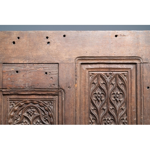 16 - A carved oak front panel of a coffer with tracery panels, 15th C.Dim.: 86,5 x 55 cm  Provenance: - T... 