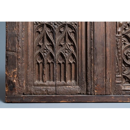 16 - A carved oak front panel of a coffer with tracery panels, 15th C.Dim.: 86,5 x 55 cm  Provenance: - T... 