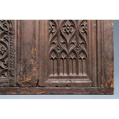 16 - A carved oak front panel of a coffer with tracery panels, 15th C.Dim.: 86,5 x 55 cm  Provenance: - T... 