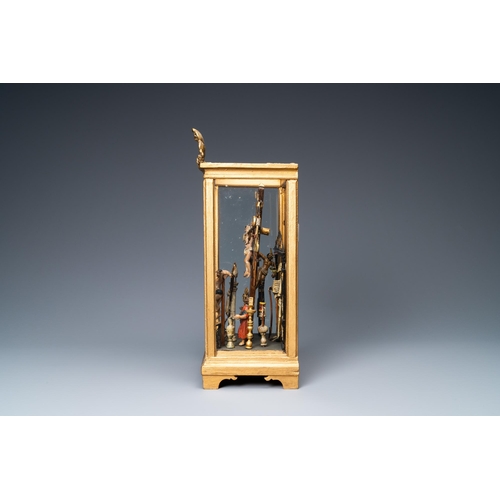 160 - A polychromed wooden 'Golgotha' group with all the Instruments of the Passion in glass display, Fran... 