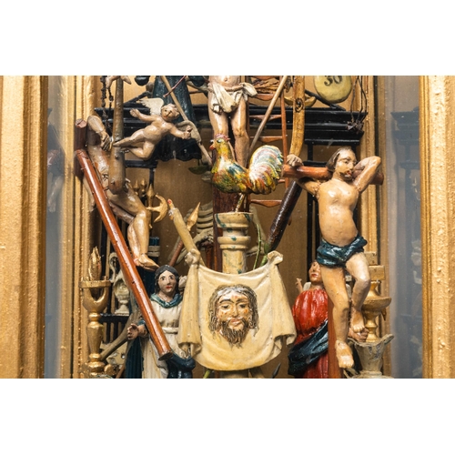 160 - A polychromed wooden 'Golgotha' group with all the Instruments of the Passion in glass display, Fran... 