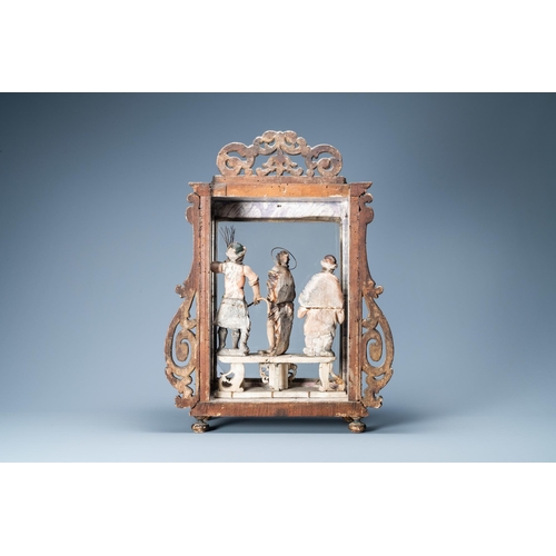 161 - A polychromed and gilded alabaster 'flagellation' group in glass display, South-Italy, 17th C.Dim.: ... 