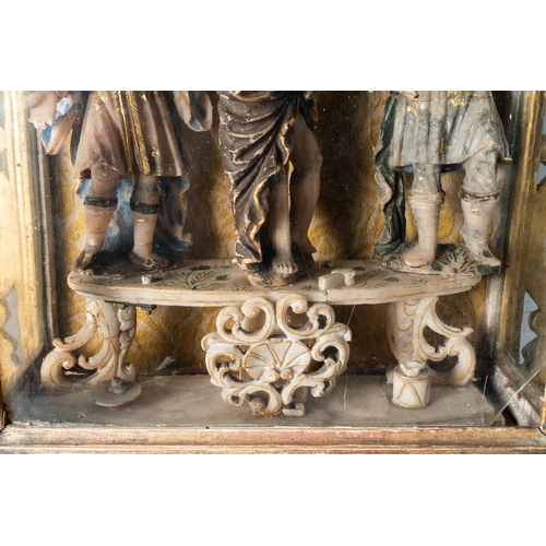 161 - A polychromed and gilded alabaster 'flagellation' group in glass display, South-Italy, 17th C.Dim.: ... 