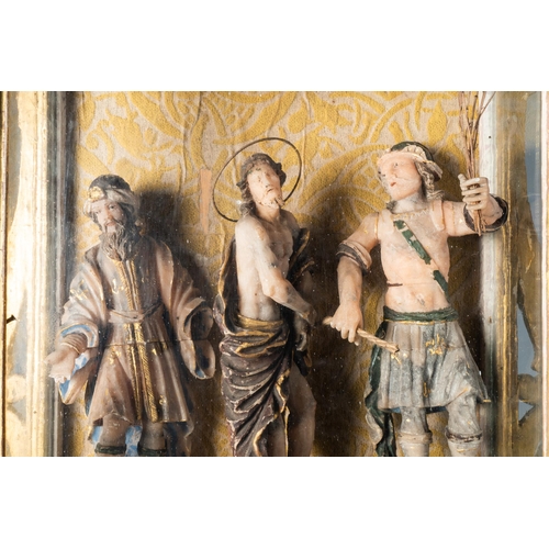 161 - A polychromed and gilded alabaster 'flagellation' group in glass display, South-Italy, 17th C.Dim.: ... 