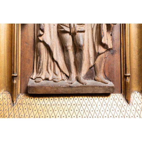 163 - A walnut 'Ecce Homo' panel in a Gothic revival architectural frame, 16th C.Dim.: 43,5 x 34,5 cm (the... 