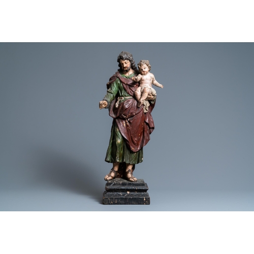 164 - A polychromed wooden figure of Saint Joseph with child, 2nd half 17th C.H.: 67 cm  Provenance: - The... 